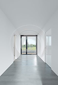 A completely white hallway corridor in a residential building