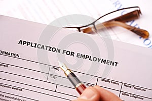 Completing an employment application photo
