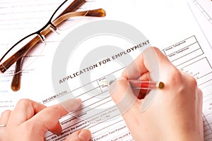 Completing an employment application photo