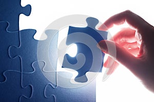 Completing the last piece of jigsaw puzzle. Solution