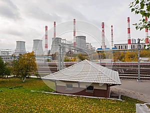 Complex of city boiler room with large pipes.