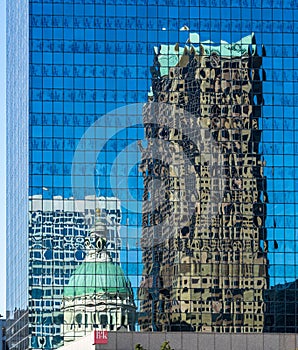 Complex reflections of a modern skyscraper in St Louis office building