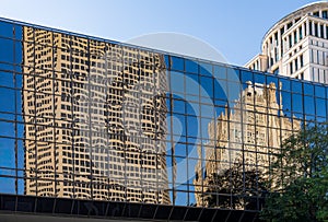 Complex reflections of a modern skyscrapers in St Louis office building