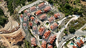 Complex of villas in the mountains aerial view 4 K