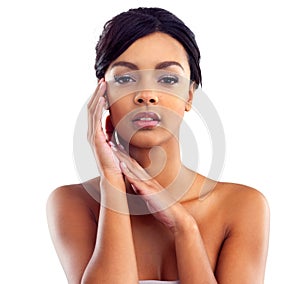 Complexion perfection. Studio portrait of a young woman with perfect skin posing against a white background.