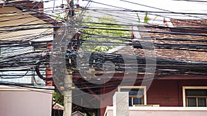 The complexity of the cable wire on street of Samui, Thailand photo