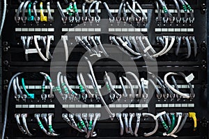 Complicated yet efficient. Cropped shot of the inside of a computer with all of its wiring located in a server room.