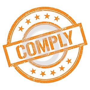 COMPLY text written on orange vintage stamp photo