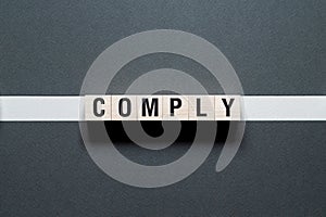 Comply word concept on cubes