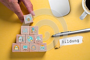 Components of digital learning as icons on cubes and the word