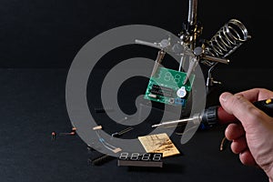 The components of the main board in the process of assembling the finished device for further use.