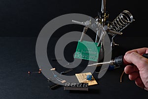 The components of the main board in the process of assembling the finished device for further use.