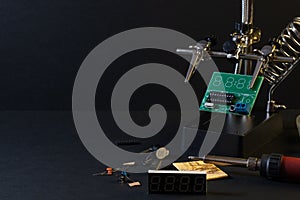 The components of the main board in the process of assembling the finished device for further use.