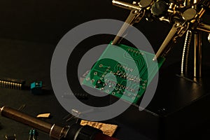 The components of the main board in the process of assembling the finished device for further use.