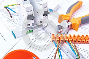 Components for use in electrical installations. Cut pliers, connectors, fuses and wires. Accessories for engineering work. photo