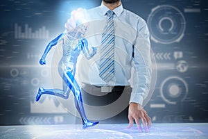 Composite 3d image of midsection of businessman touching invisible screen at desk