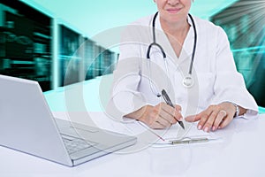 Composite 3d image of midsection of female doctor writing prescription at desk