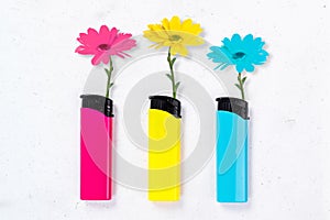 Composite collage illustration of flowers growth three colorful lighters instead flame isolated on bright background