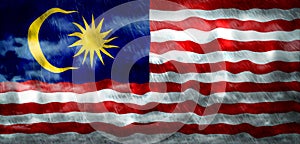 Composite of Flag of Malaysia and rain clouds. Symbolizing heavy rains, storms, typhoons and other bad weather in the country.