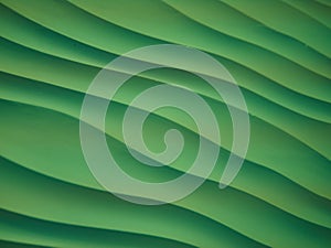 Composite green waved background. green waved pattern close up