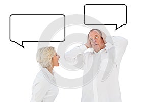 Composite image of angry older couple arguing with each other