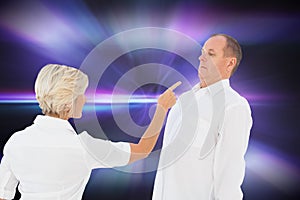 Composite image of angry older couple arguing with each other