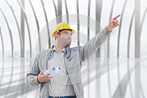 Composite image of architect pointing