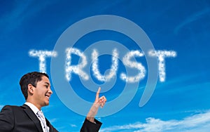 Composite image of asian businessman pointing