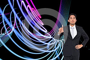 Composite image of asian businessman pointing