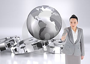 Composite image of asian businesswoman pointing