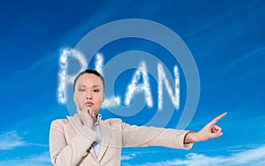 Composite image of asian businesswoman pointing