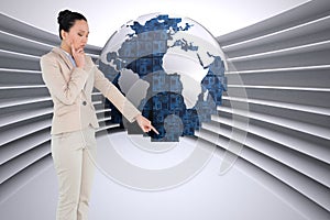 Composite image of asian businesswoman pointing