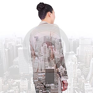 Composite image of asian businesswoman walking