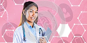 Composite image of asian doctor holding clipboard