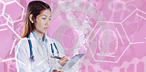 Composite image of asian doctor writing on files