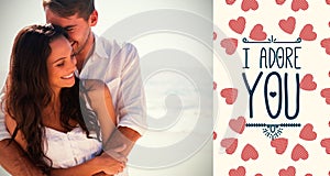 Composite image of attractive couple cuddling and valentines words