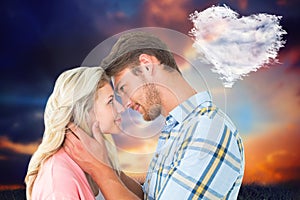 Composite image of attractive couple smiling at each other