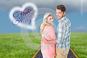 Composite image of attractive couple turning and smiling at camera