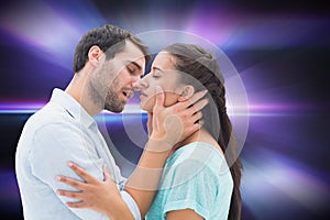 Composite image of attractive young couple about to kiss