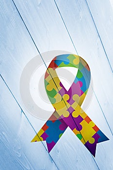 Composite image of autism awareness ribbon