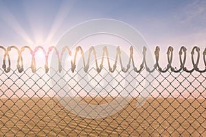 Composite image of barbed wire fence by white background