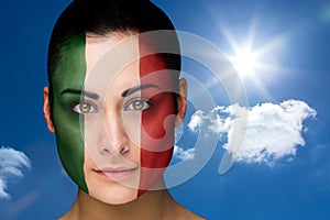 Composite image of beautiful brunette in italy facepaint
