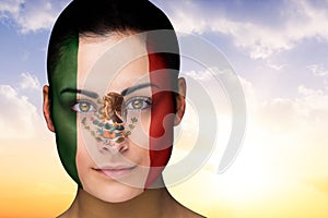 Composite image of beautiful brunette in mexico facepaint