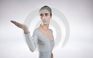 Composite image of beautiful woman gesturing against white background