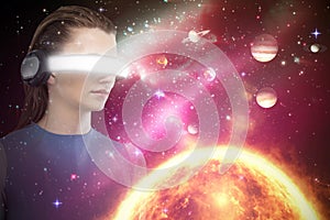 Composite image of beautiful woman using virtual reality headset 3d