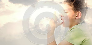 Composite image of boy using an asthma inhaler in clinic photo