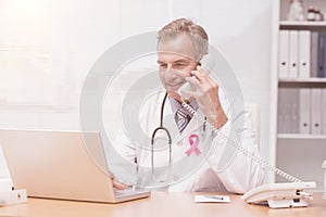 Composite image of breast cancer awareness ribbon