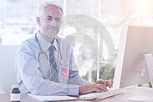 Composite image of breast cancer awareness ribbon