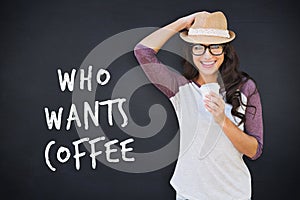 Composite image of brunette with disposable cup