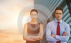 Composite image of business colleagues posing with crossed arms